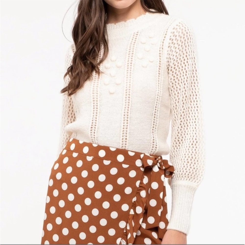 E&M Pompom cutout beige sweater size M